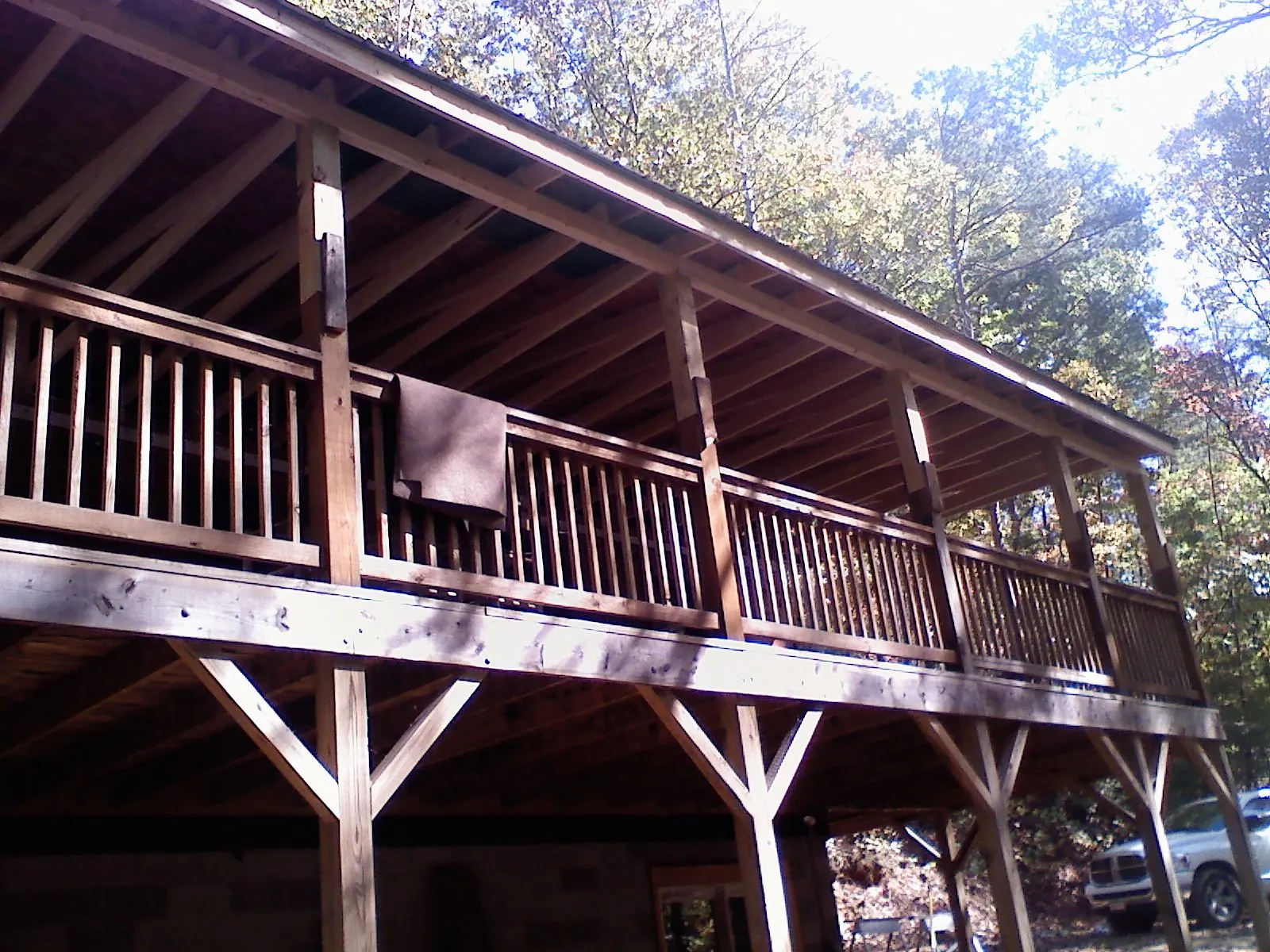 Timber framing under a new elevated porch and deck — Roof Leak Repair in Dalbo by Roofing Brothers